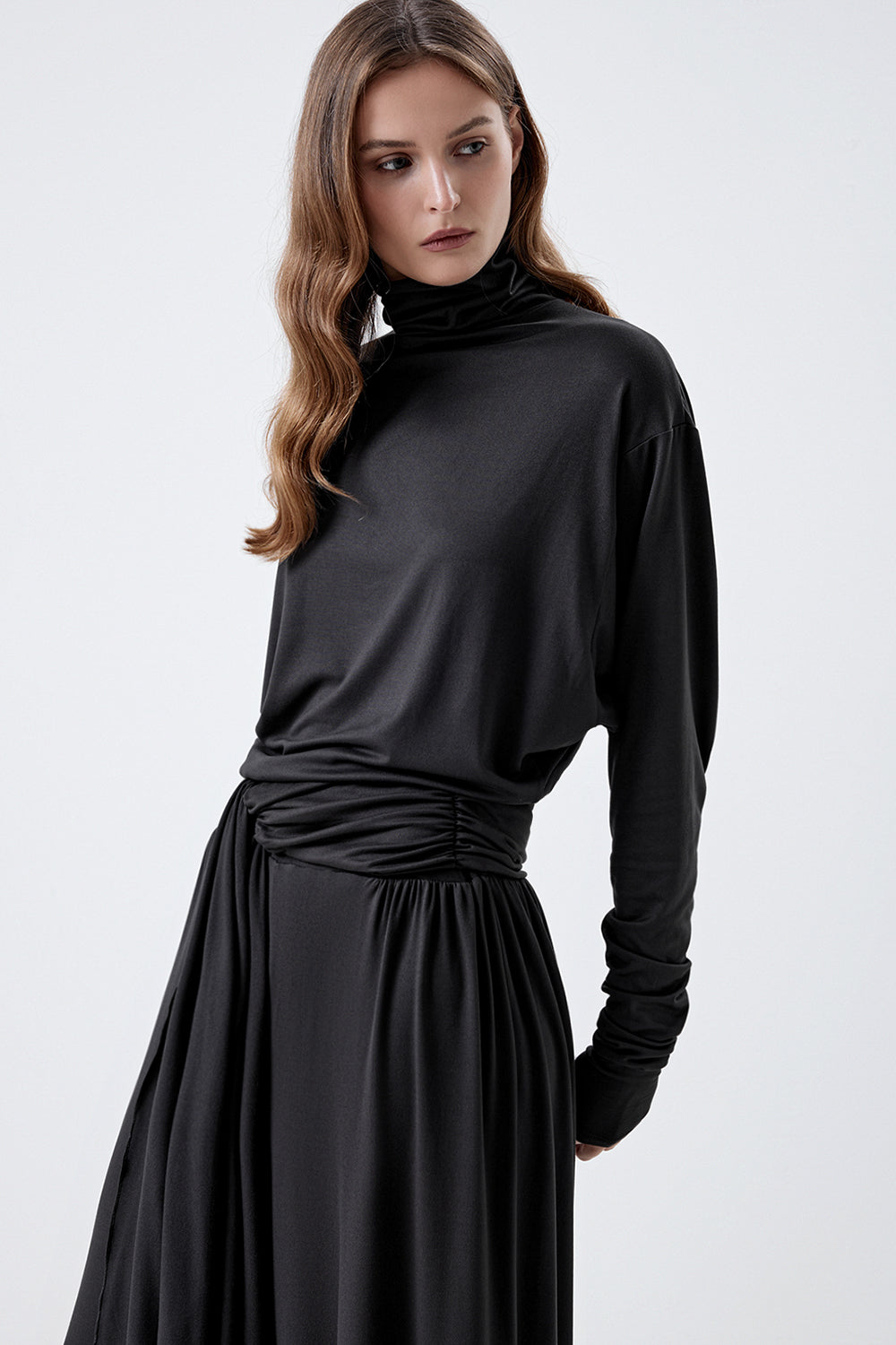 Long-sleeve top with a high neck and a waistband