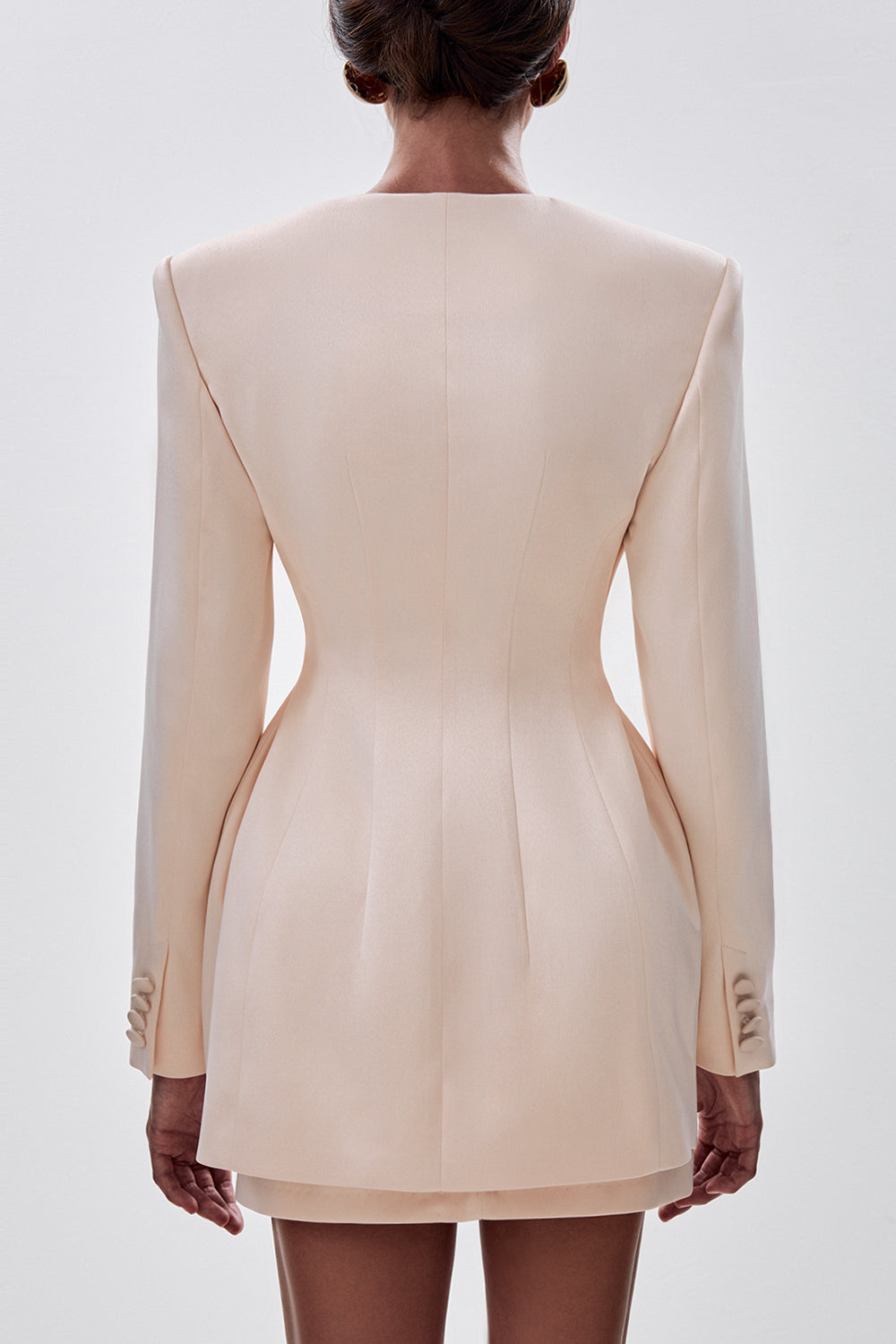 Fitted jacket with asymmetrical fastening