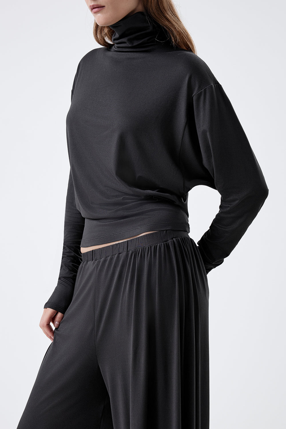 Long-sleeve top with a high neck and a waistband