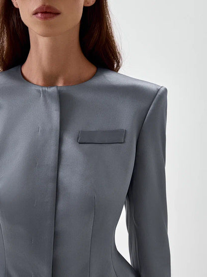 Fitted jacket with asymmetrical fastening