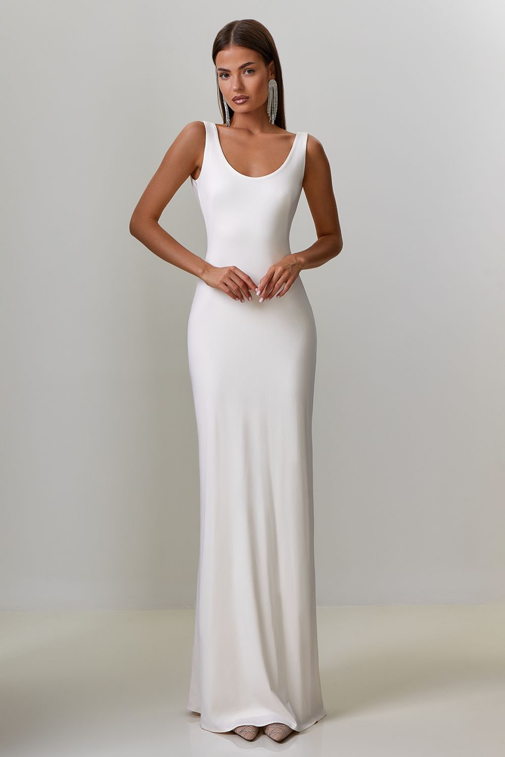 Dress with drapery on the back