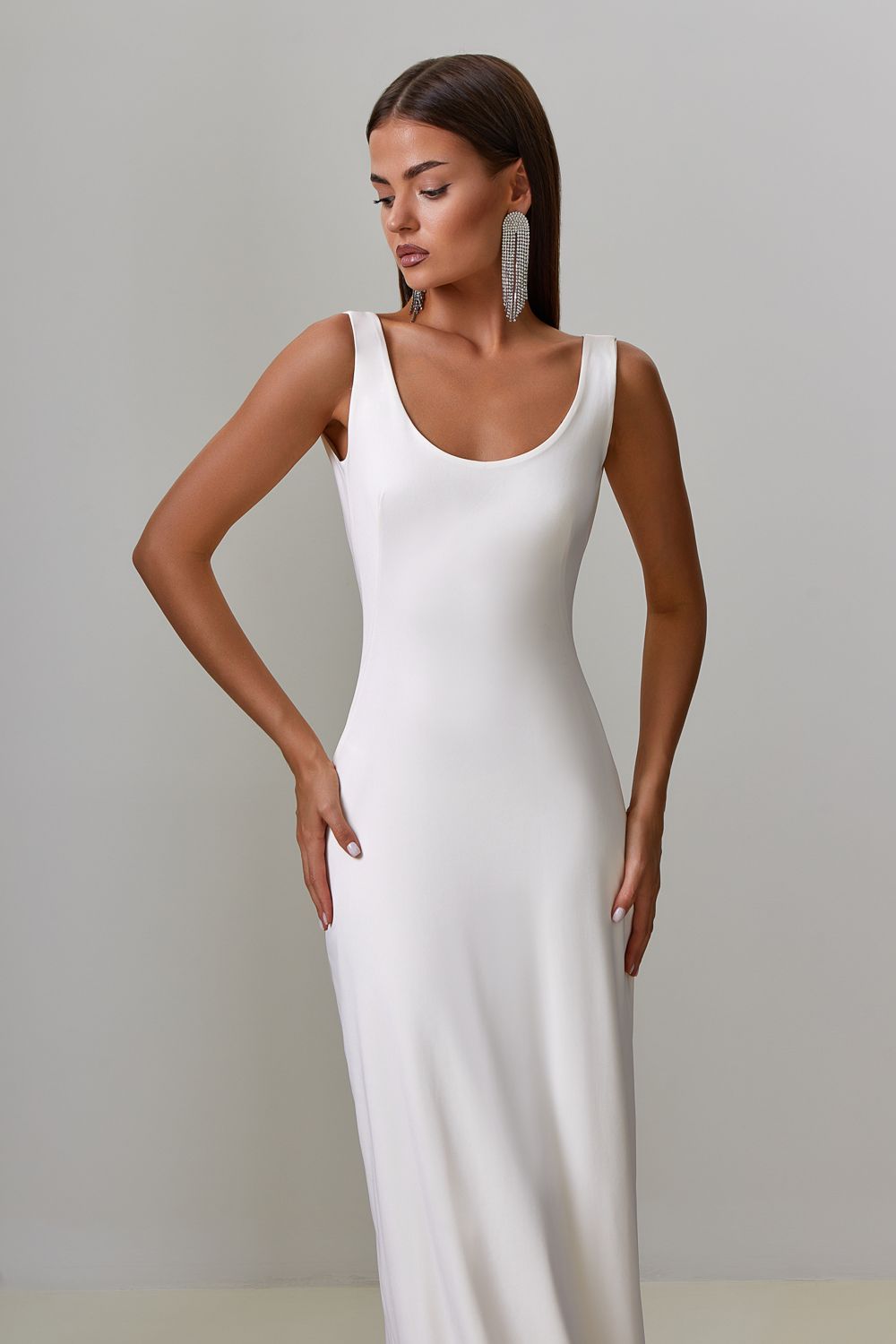 Dress with drapery on the back
