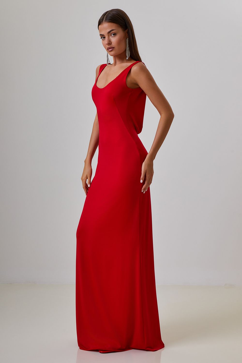 Dress with drapery on the back