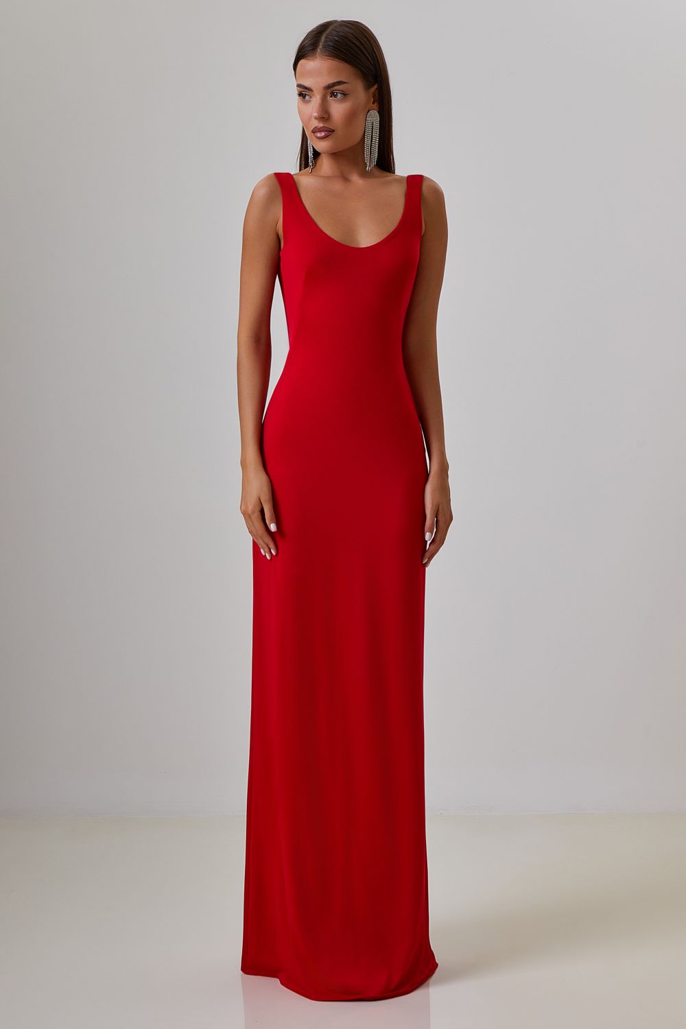 Dress with drapery on the back