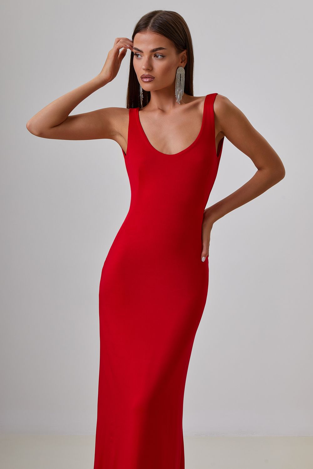 Dress with drapery on the back