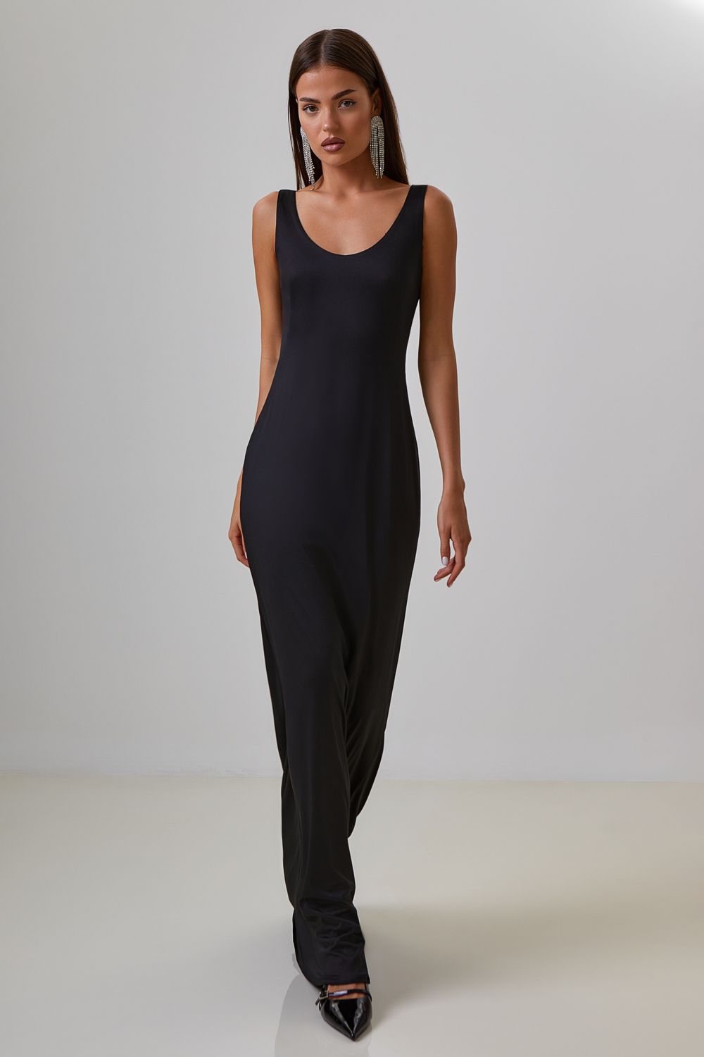 Dress with drapery on the back