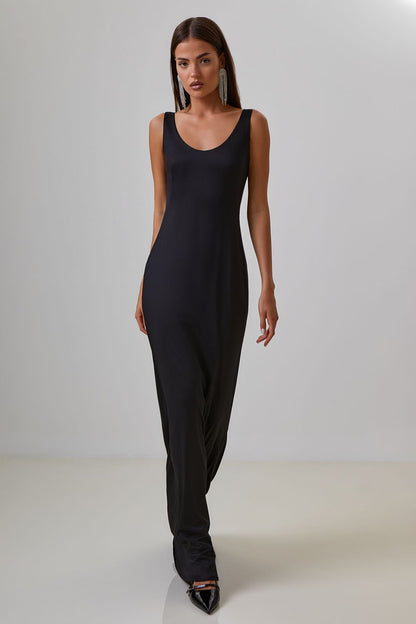 Dress with drapery on the back