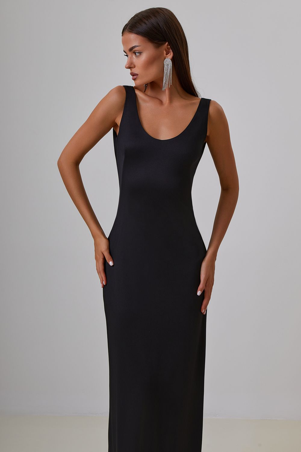 Dress with drapery on the back