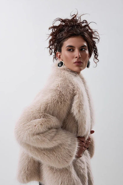 Cropped faux fur coat with a notched collar