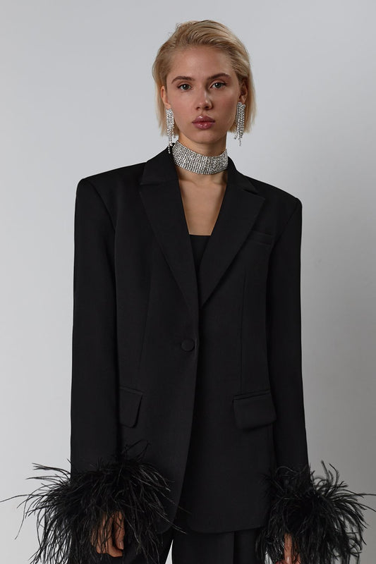 Jacket with feathers on the sleeves