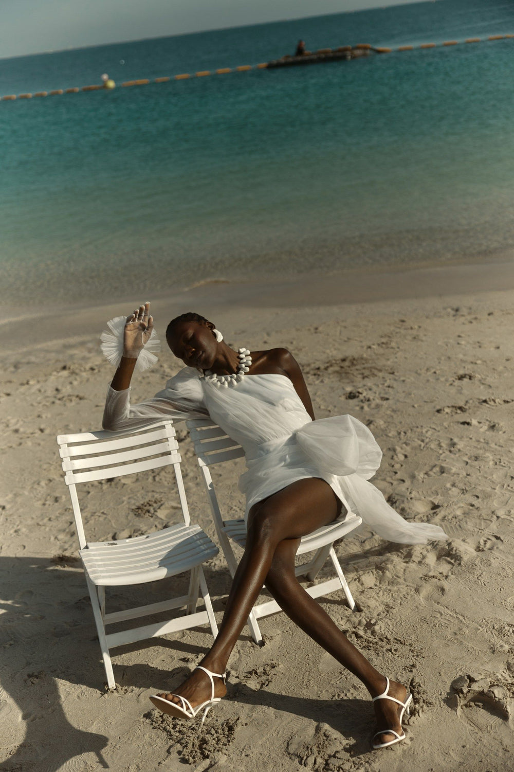 THE BRIDE. THE SEA. THE SUN. AND THE DRESS.