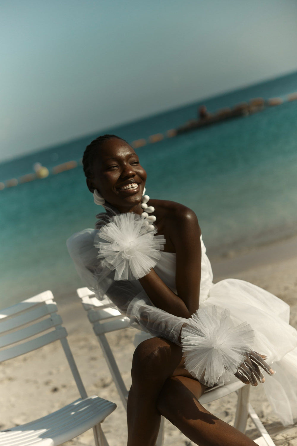 THE BRIDE. THE SEA. THE SUN. AND THE DRESS.