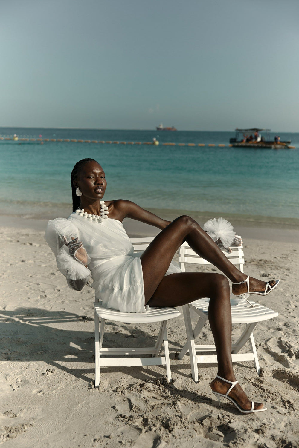 THE BRIDE. THE SEA. THE SUN. AND THE DRESS.