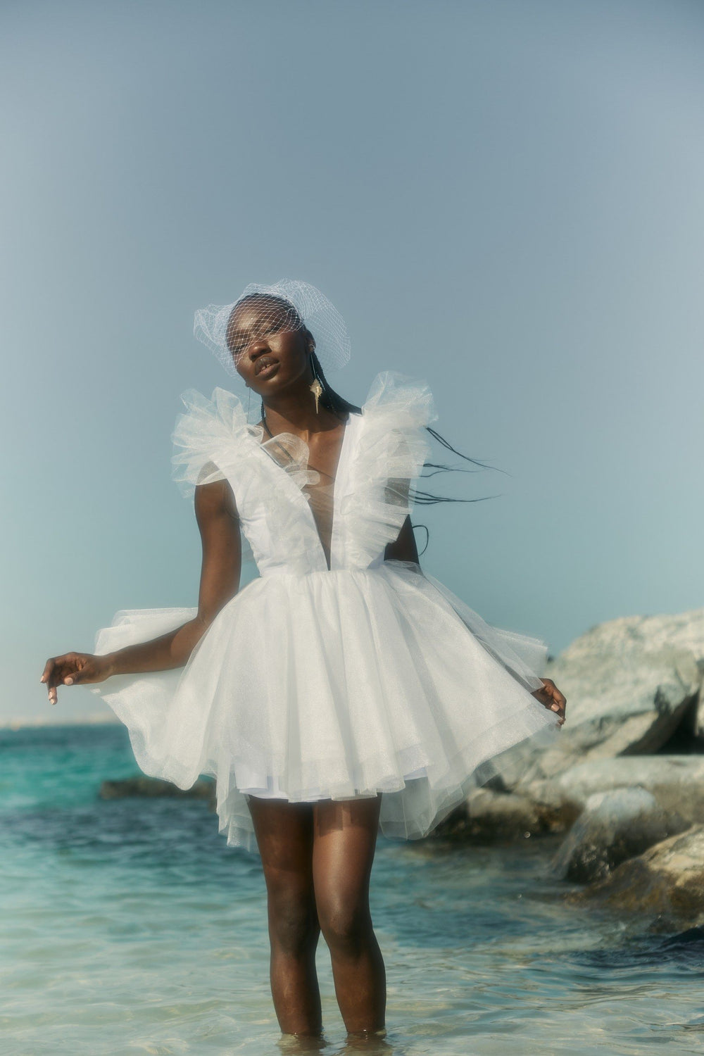 THE BRIDE. THE SEA. THE SUN. AND THE DRESS.