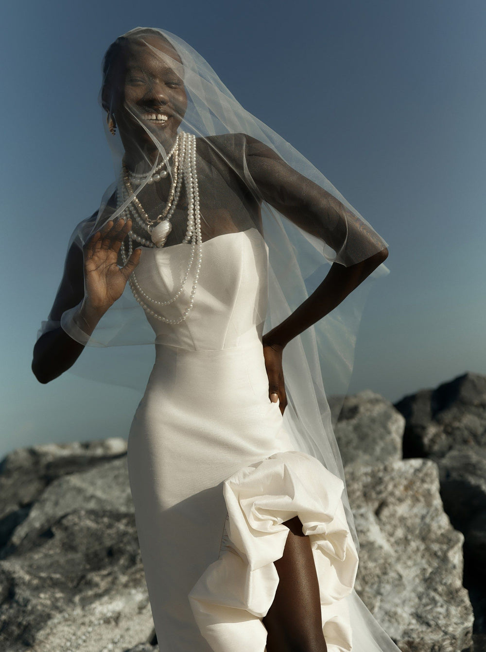 THE BRIDE. THE SEA. THE SUN. AND THE DRESS.