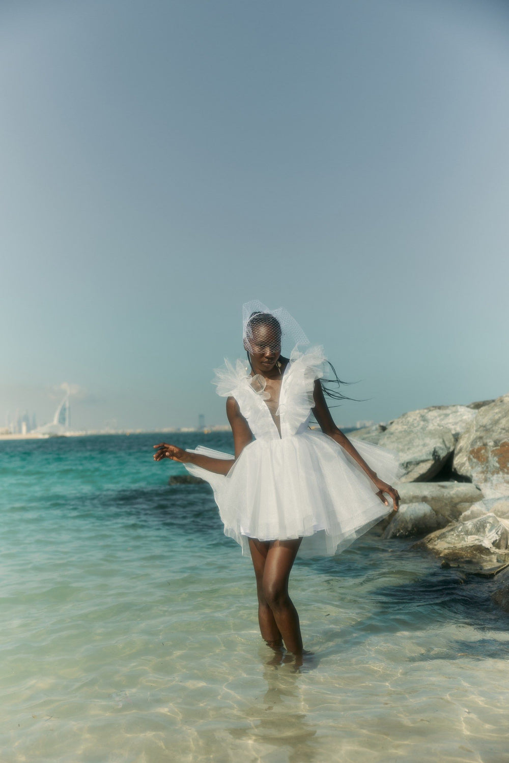 THE BRIDE. THE SEA. THE SUN. AND THE DRESS.