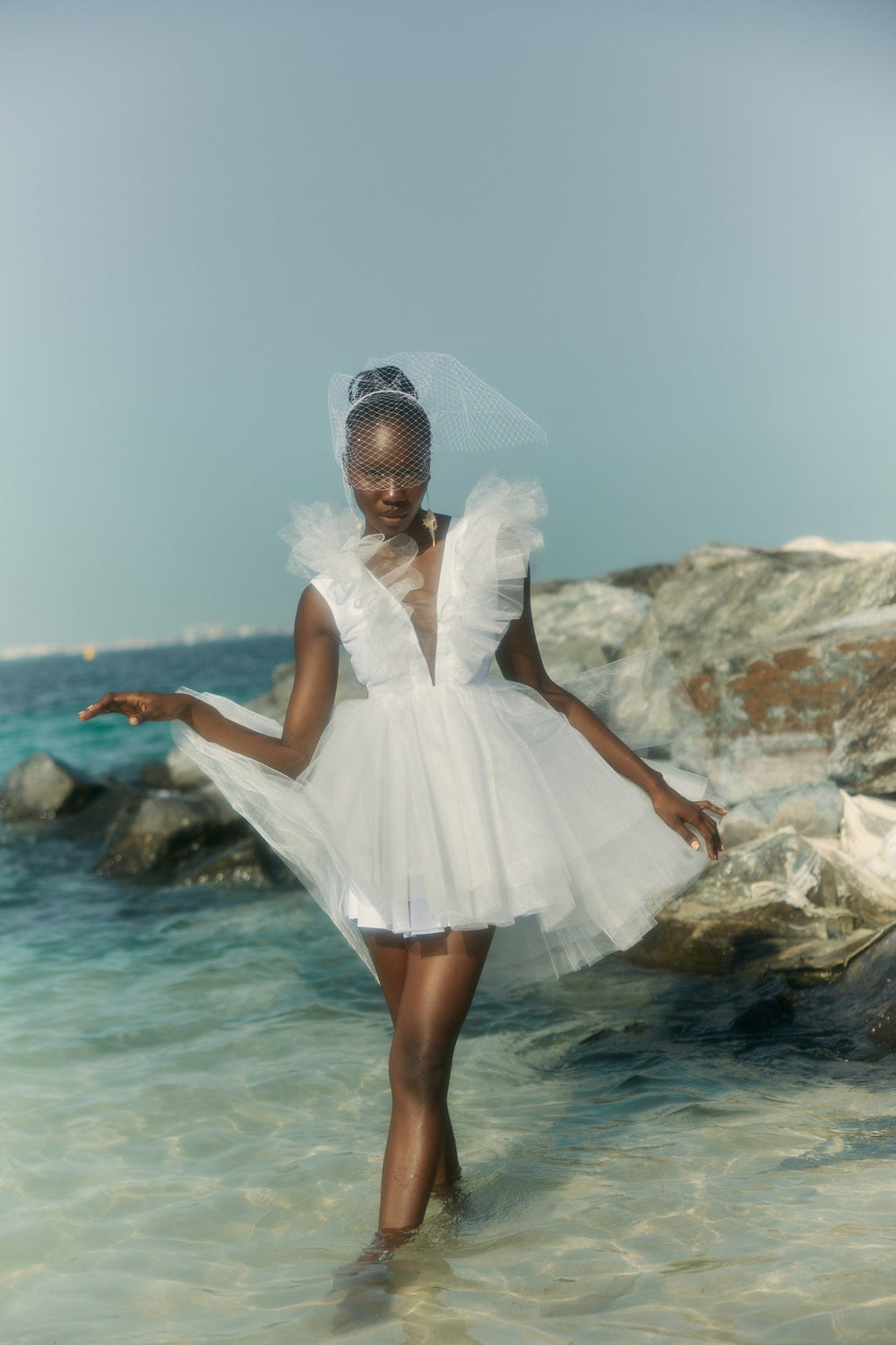 THE BRIDE. THE SEA. THE SUN. AND THE DRESS.