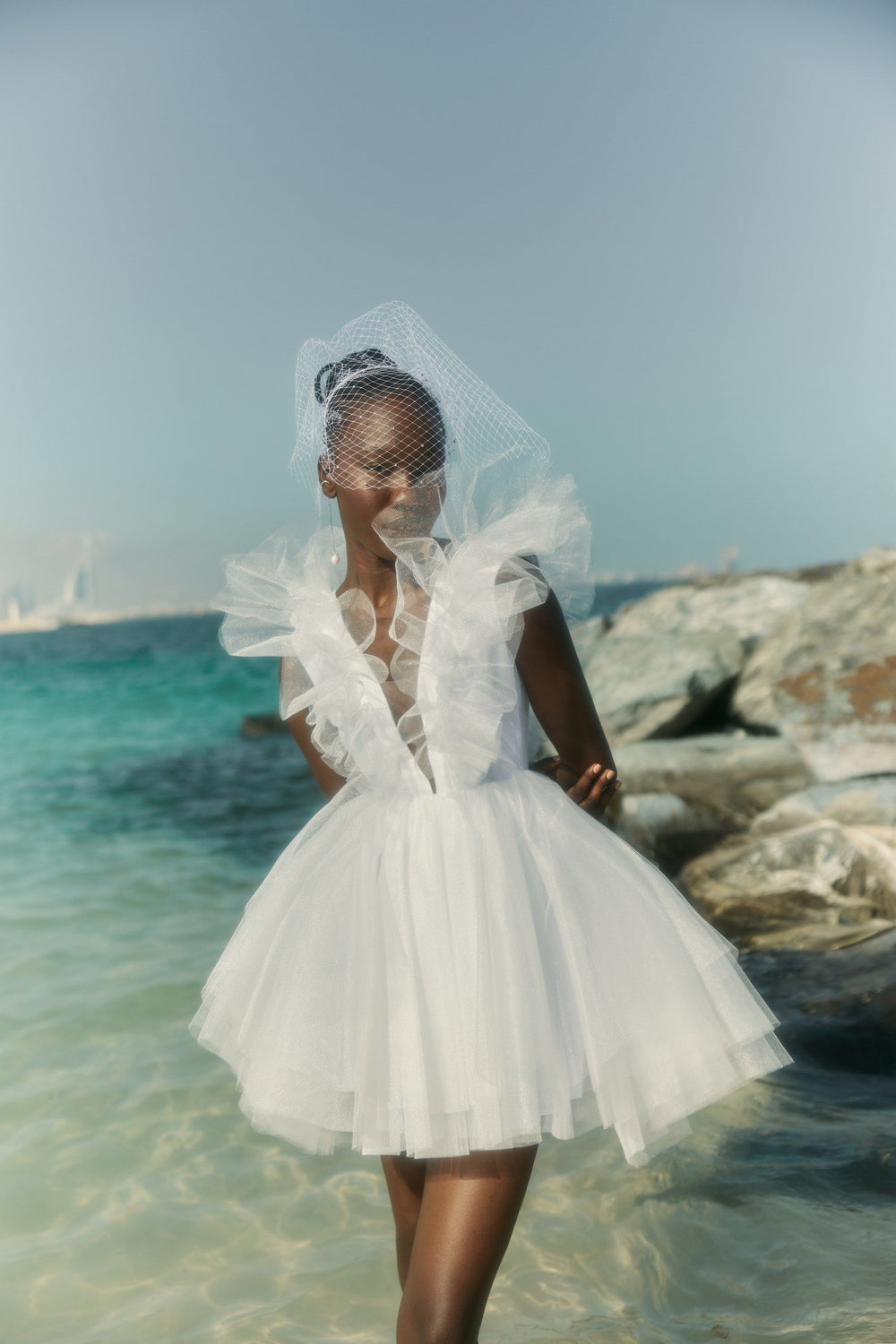 THE BRIDE. THE SEA. THE SUN. AND THE DRESS.