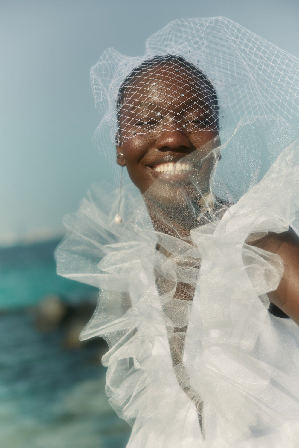 THE BRIDE. THE SEA. THE SUN. AND THE DRESS.