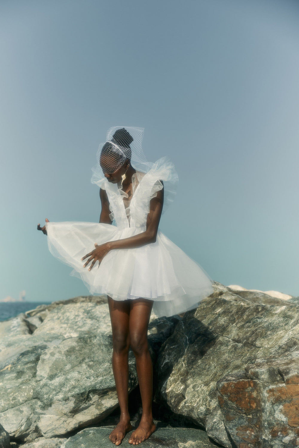 THE BRIDE. THE SEA. THE SUN. AND THE DRESS.