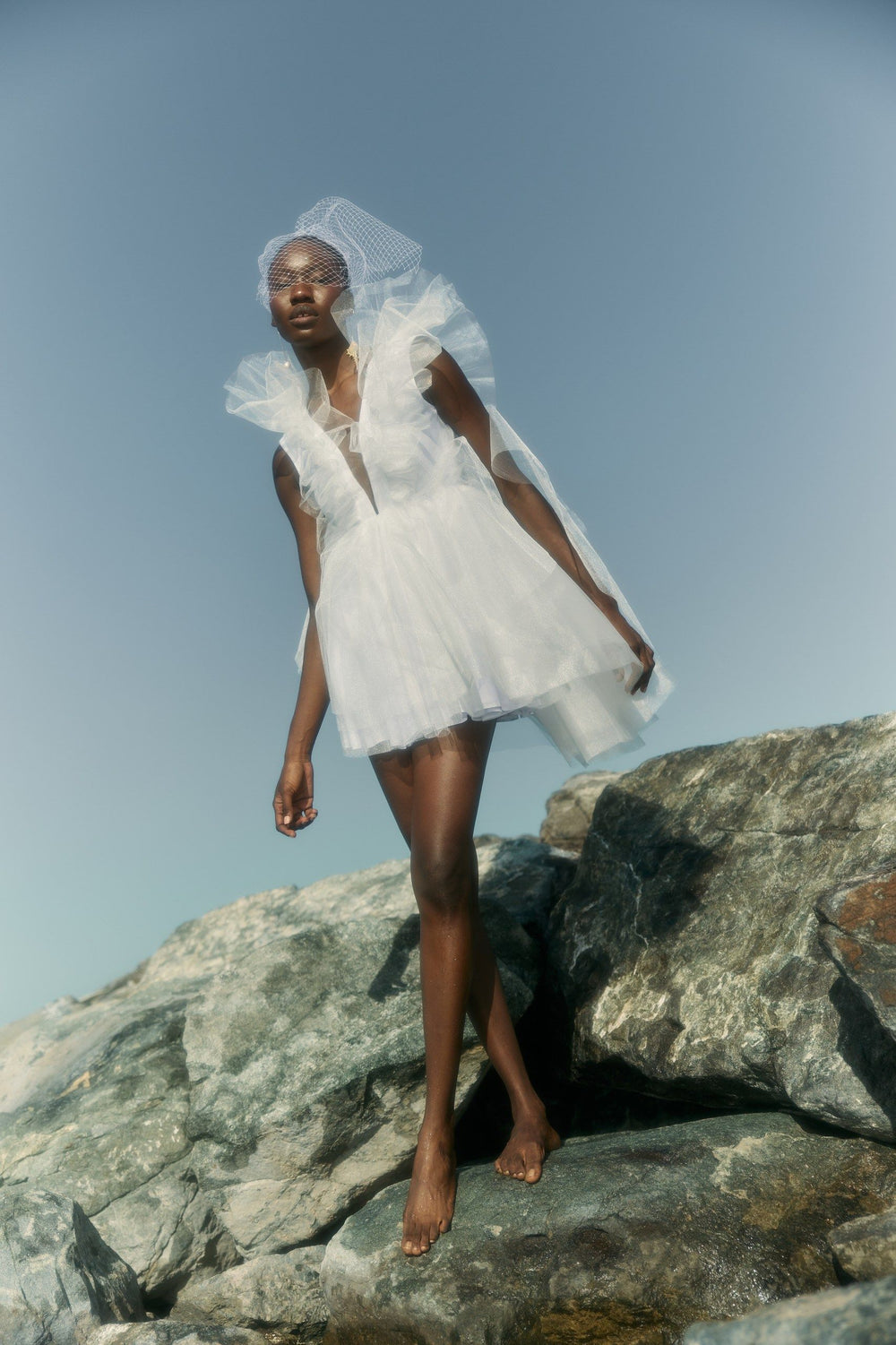 THE BRIDE. THE SEA. THE SUN. AND THE DRESS.