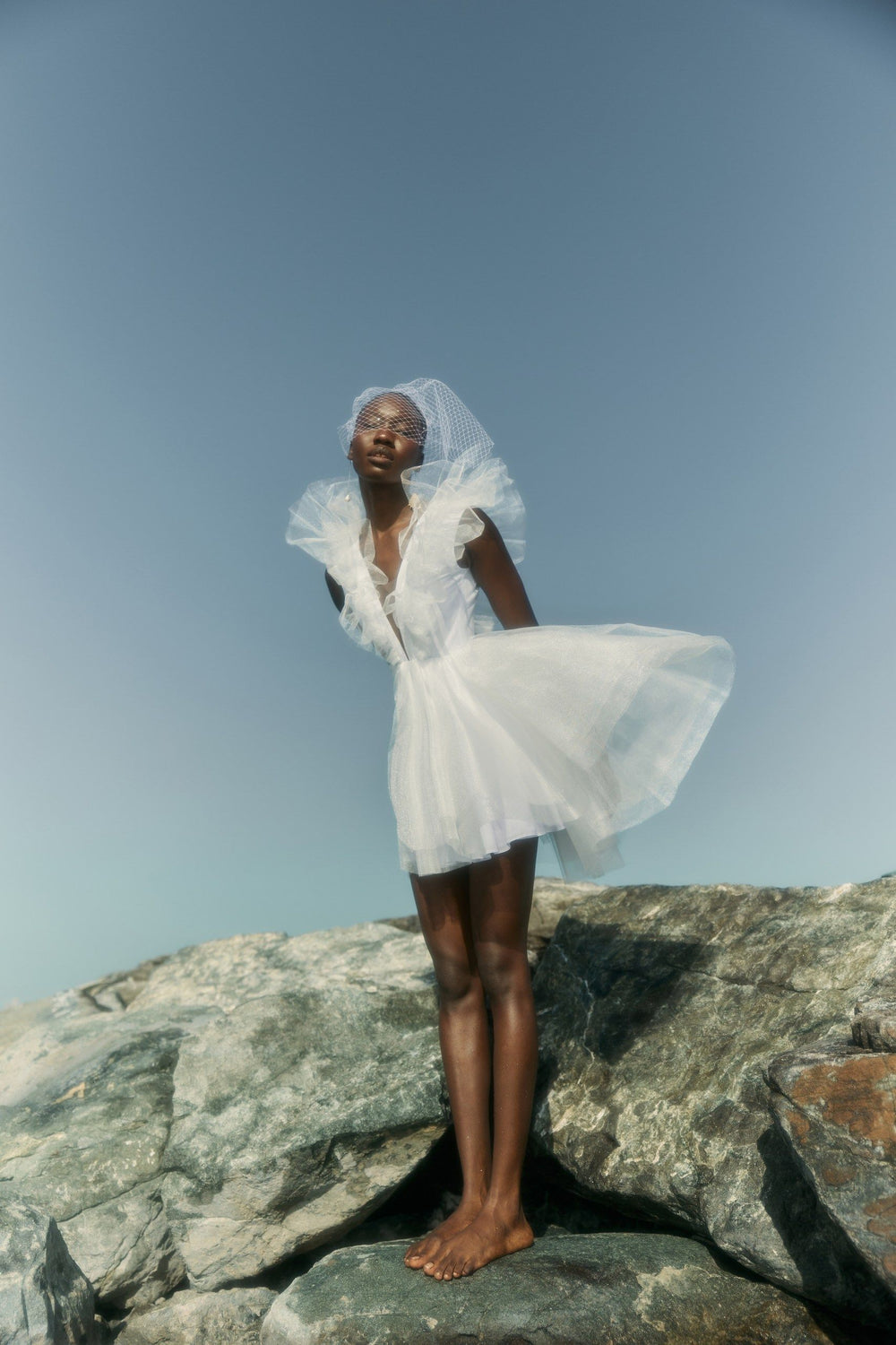 THE BRIDE. THE SEA. THE SUN. AND THE DRESS.
