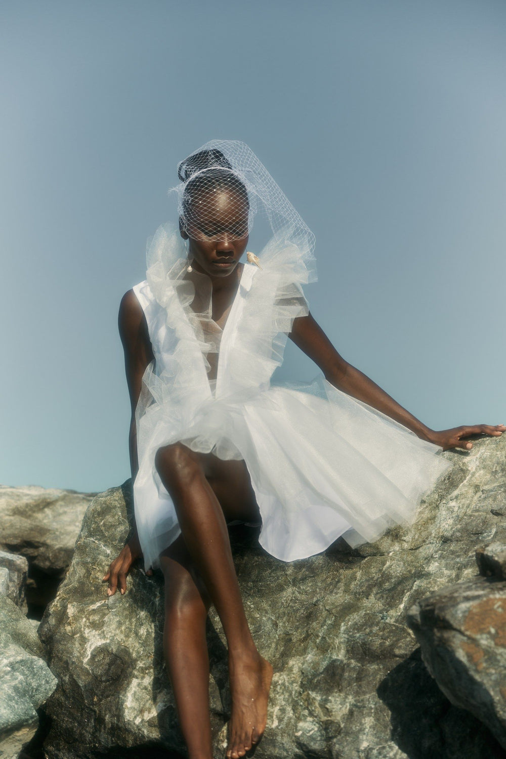 THE BRIDE. THE SEA. THE SUN. AND THE DRESS.