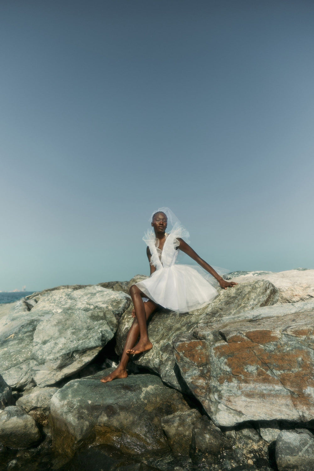 THE BRIDE. THE SEA. THE SUN. AND THE DRESS.