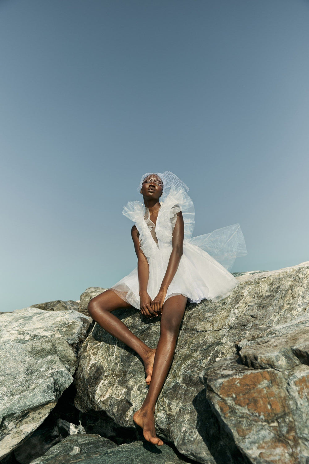 THE BRIDE. THE SEA. THE SUN. AND THE DRESS.