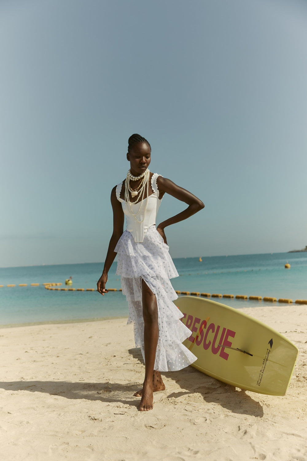 THE BRIDE. THE SEA. THE SUN. AND THE DRESS.