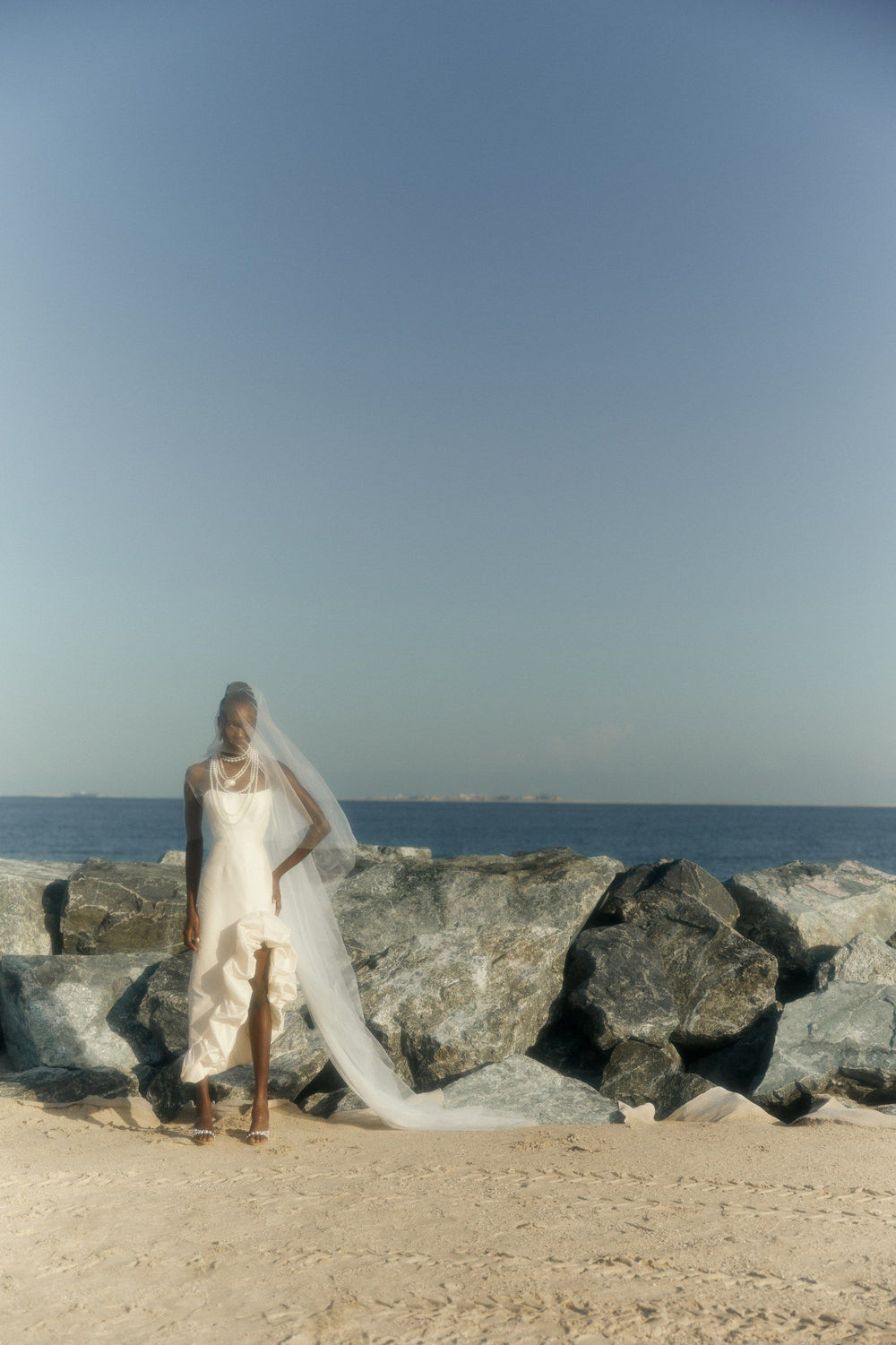 THE BRIDE. THE SEA. THE SUN. AND THE DRESS.