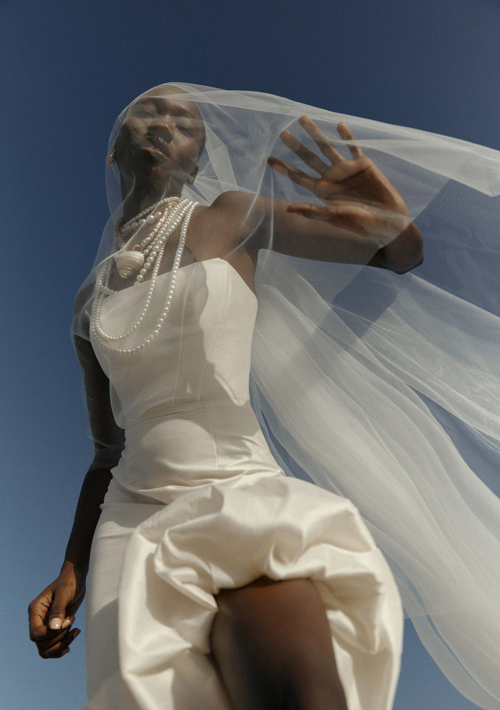THE BRIDE. THE SEA. THE SUN. AND THE DRESS.