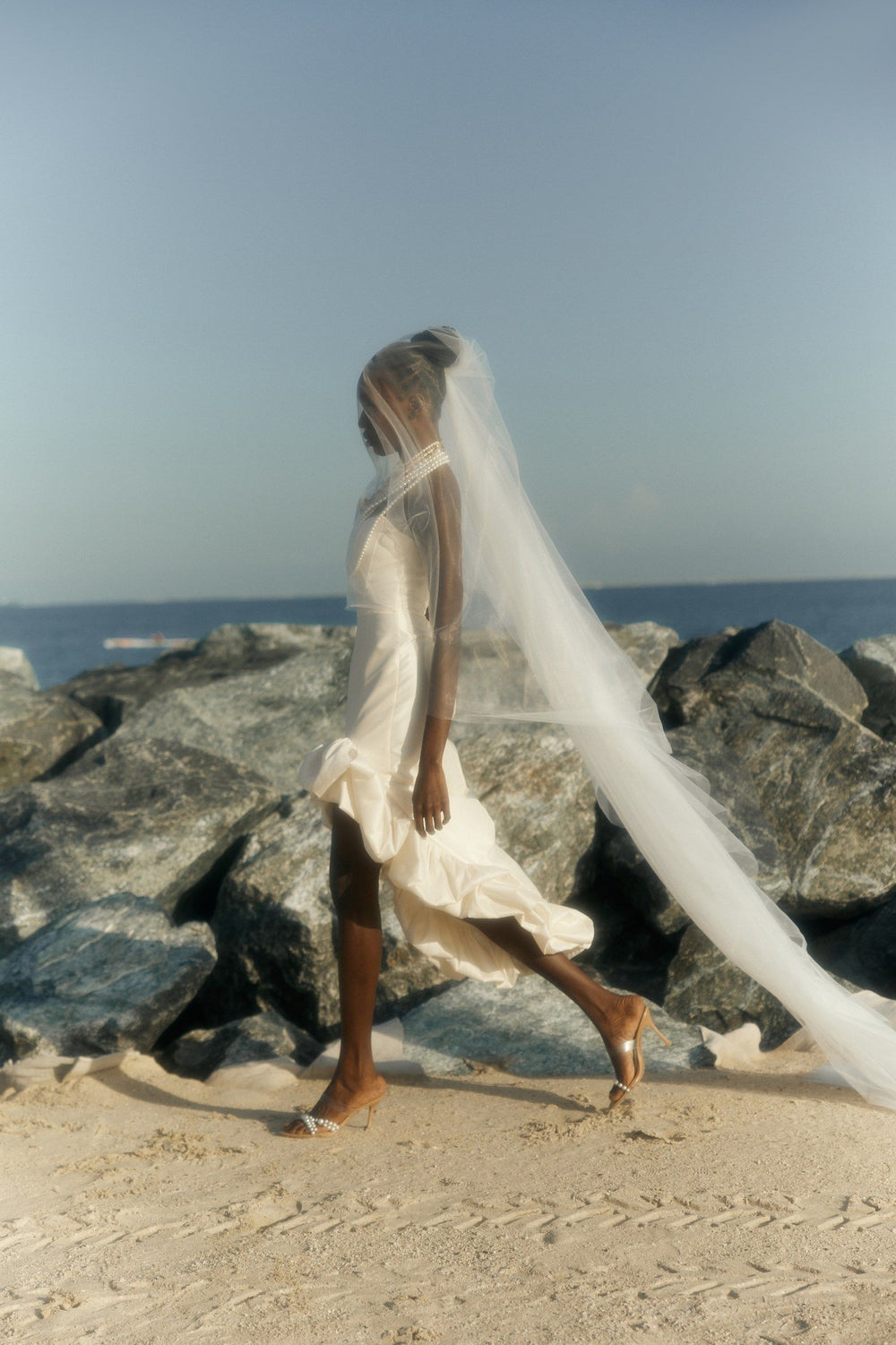 THE BRIDE. THE SEA. THE SUN. AND THE DRESS.