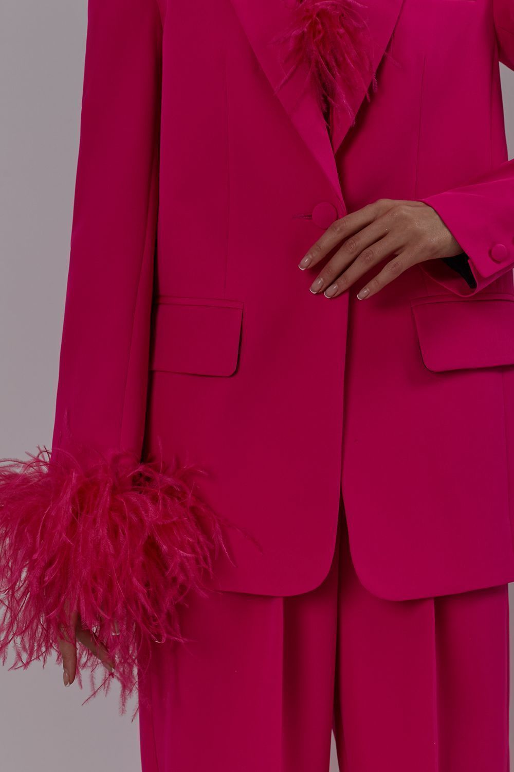 Jacket with feathers on the sleeves